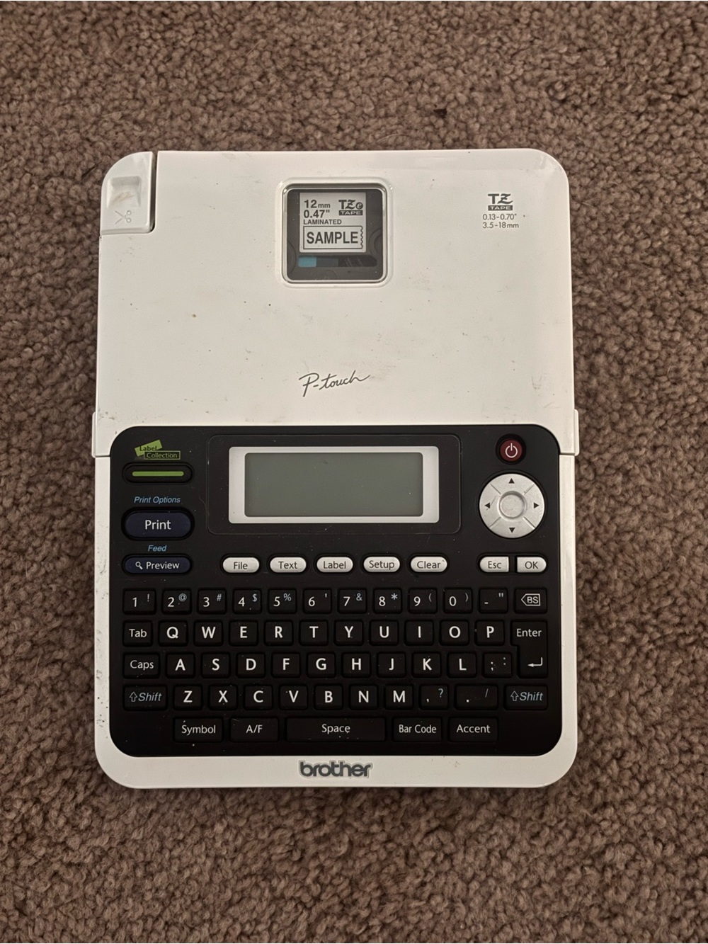 Brother label maker — white with black text